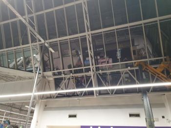 1. RN07 dual solarfilm to atrium. Asda - Owlcoates Shopping Centre in Pudsey