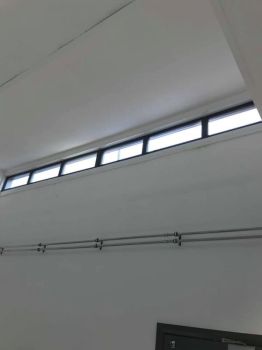 Translucent coloured vinyls installed to skylights Pity Me Day Care Centre